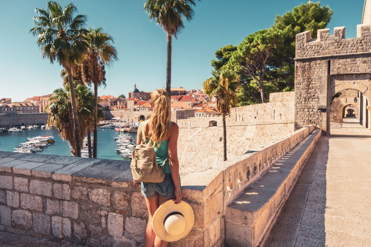 Female tourist on the city walls in Dubrovnik